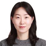Woman in Grey Sweater with White Background